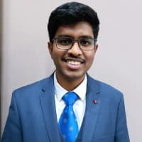 Dinesh M
